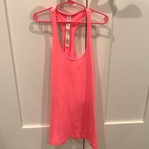 Bright pinkish orange Lulu tank top